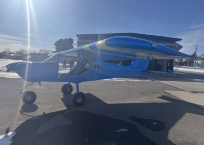 Image of a 2025 Rans S-21 Outbound, Navy with two yellow wing stripes.